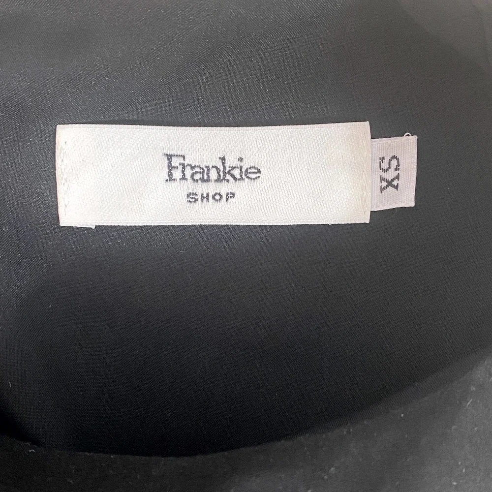 The Frankie Shop LouLou Sleeveless Flouncy Hem Maxi Dress in Black - Picture 6 of 6